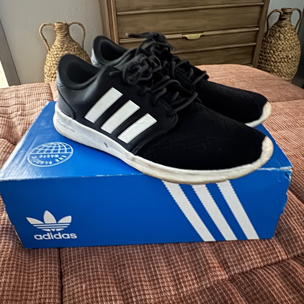 Adidas Women’s Black Sneakers with White Stripes